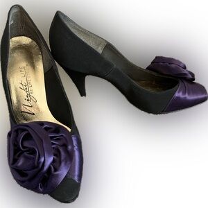 Black fabric hi heeled shoe